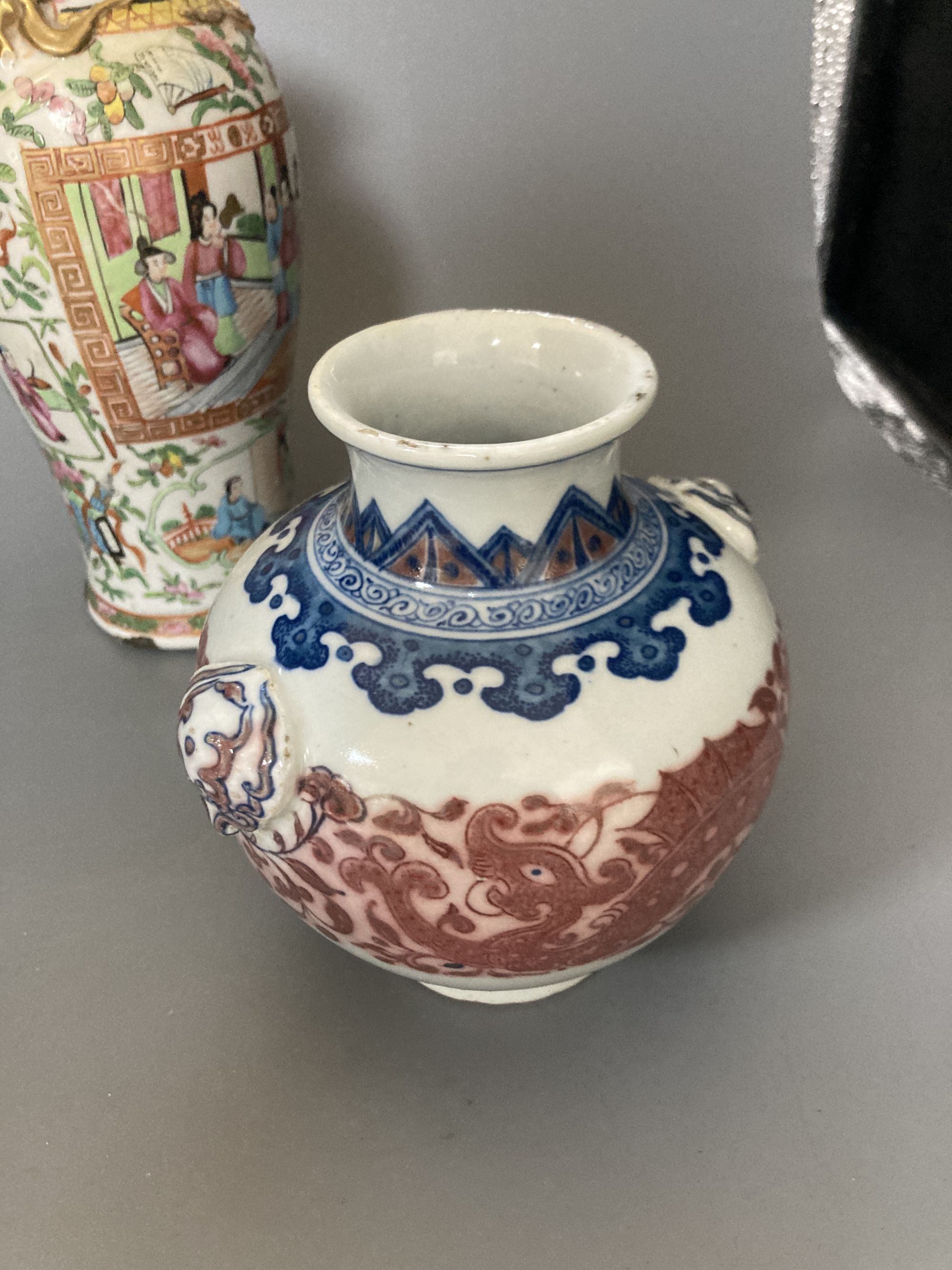 Two 19th century Chinese famille rose vases, a cover and another vase, tallest 26cm